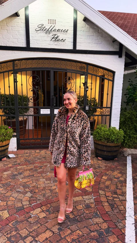 Tanya V., Kaya member with designer bag